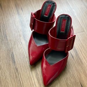 Gently worn faux leather mule